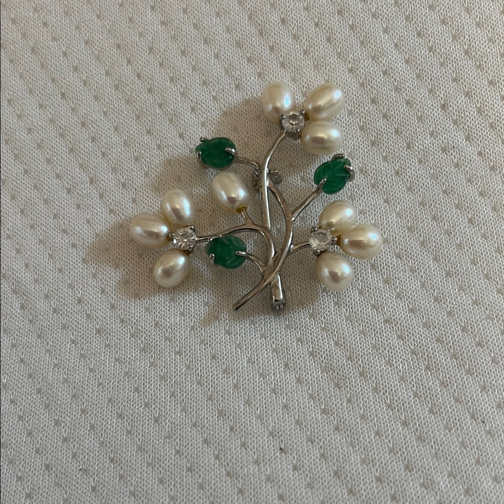 Elegant Silver and Green Floral Brooch